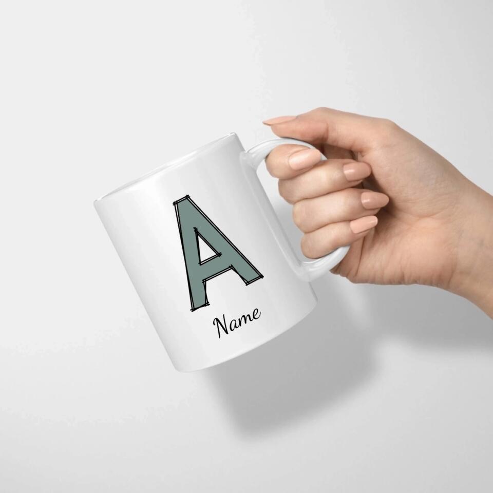 Tasse mit Buchstaben