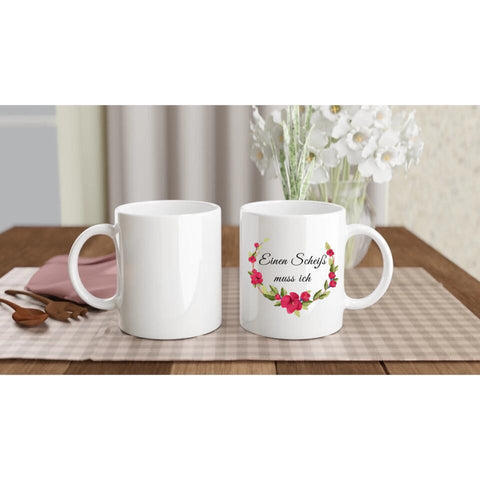 Tasse mit Blümchen Motiv und lustigen Spruch "Einen Scheiß muss ich".