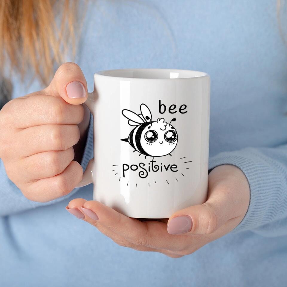 Tasse mit lustigen Motiv "Bee Positive"