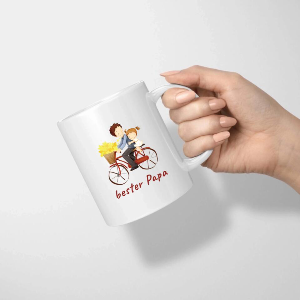 Vater Tasse mit Motiv von Papa und Tochter auf dem Fahrrad und unten mit dem Text "bester Papa"