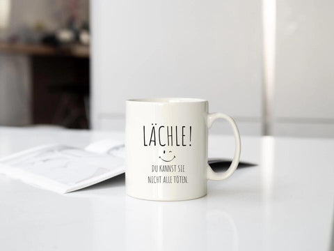 Lächle du kannst sie nicht alle töten Tasse