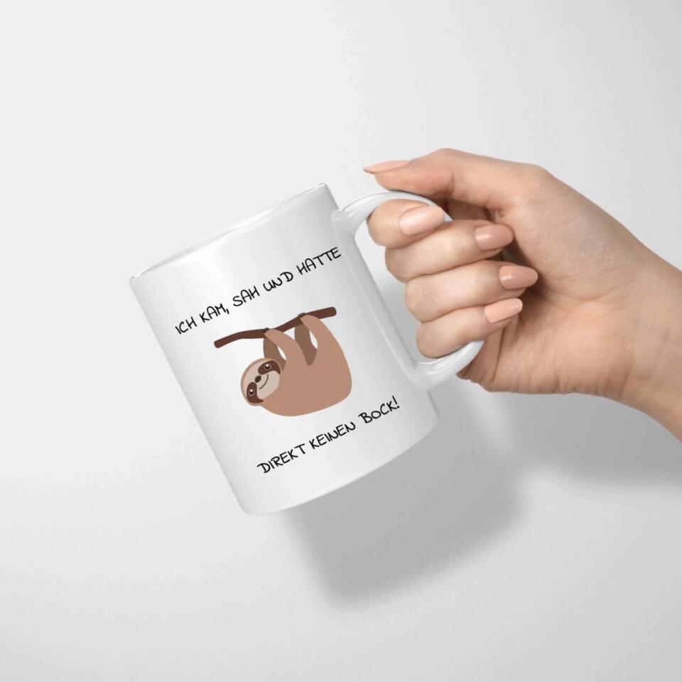 Tasse mit einer Zeichnung eines Faultiers, das sagt: "Ich kam, sah und hatte direkt keinen Bock!"